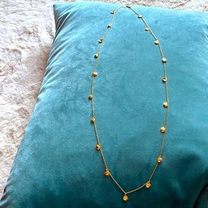 Stella & Dot long gold necklace with hanging discs